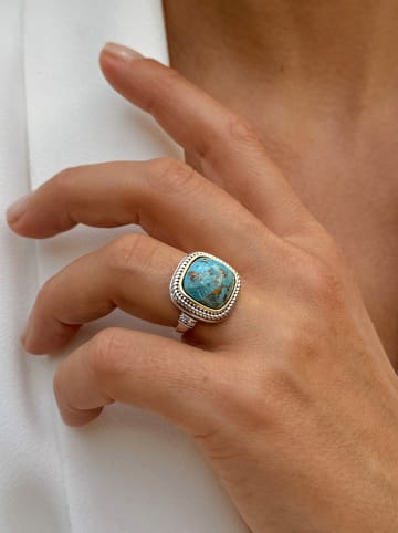 Nomad Vergold. Ring mit Edelstein