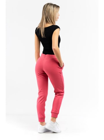 Moschino Spodnie dresowe w kolorze różowym