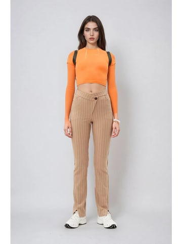 Weekday Spodnie w kolorze beżowym