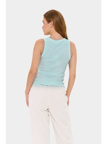 SAINT TROPEZ Top "Aster" w kolorze turkusowym