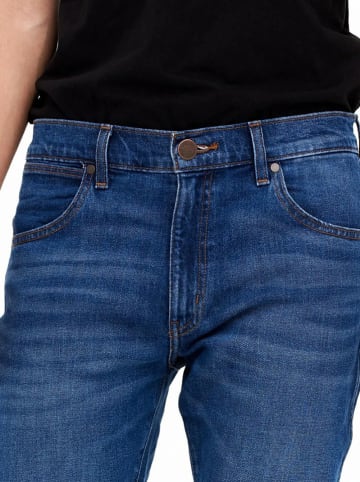 Wrangler Dżinsy - tapered fit - w kolorze niebieskim