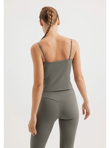 Rethinkit Top funkcyjny "True to body" w kolorze zielonym
