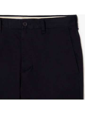 Lacoste Spodnie chino w kolorze granatowym