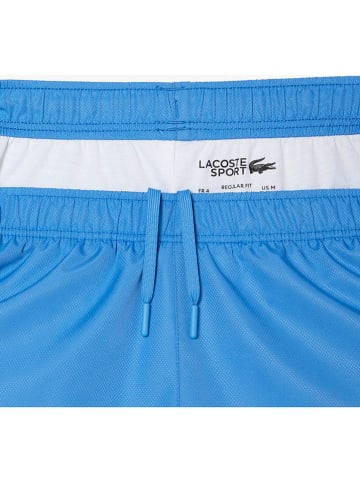 Lacoste Spodnie sportowe w kolorze błękitnym