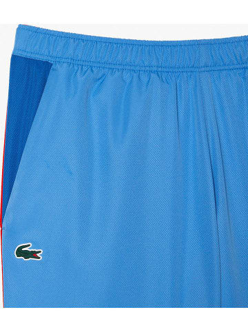 Lacoste Spodnie sportowe w kolorze błękitnym