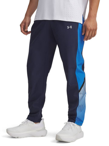 Under Armour Spodnie dresowe "Velociti" w kolorze granatowym