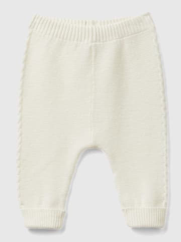 Benetton Spodnie w kolorze kremowym