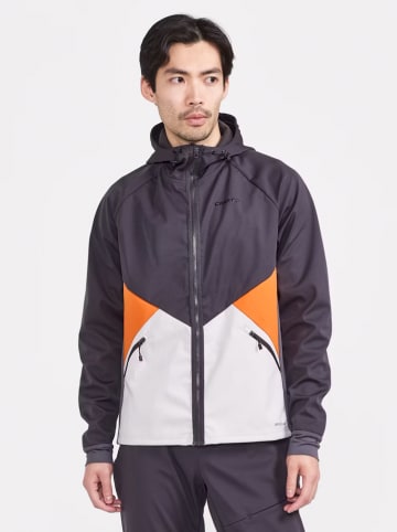 Craft Trainingsjacke "Core Glide" in Anthrazit/ Orange/ Weiß