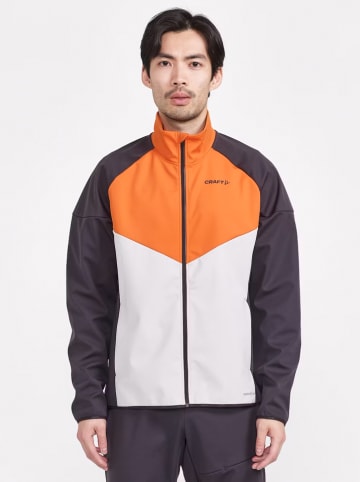 Craft Trainingsjacke "Glide Block" in Anthrazit/ Orange/ Weiß