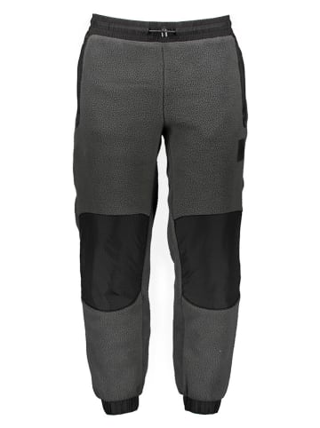 The North Face Spodnie polarowe "Fleeski" w kolorze szaro-czarnym