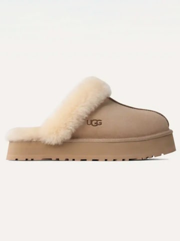 UGG Skórzane kapcie "Disquette" w kolorze beżowym
