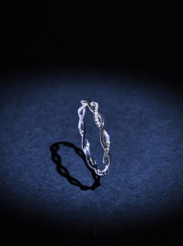 DIAMANTA Witgouden ring "Entortillement" met diamanten
