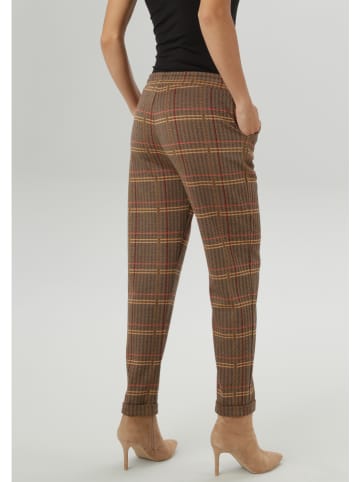 Aniston Hose in Camel/ Rot