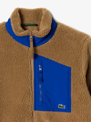Lacoste Kurtka polarowa w kolorze jasnobrązowo-niebieskim