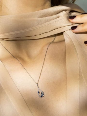 CARATELLI Złota zawieszka "Saphir Elixir" z diamentami