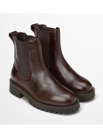 Marc O'Polo Shoes Skórzane sztyblety "Phia" w kolorze brązowym