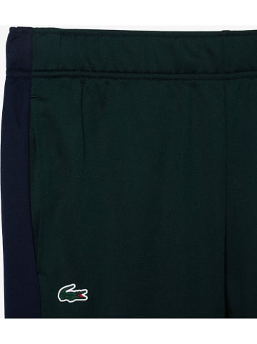 Lacoste Spodnie sportowe w kolorze ciemnozielonym