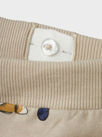 name it Spodnie dresowe "Kody" w kolorze beżowym