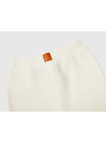 Benetton Spodnie w kolorze kremowym