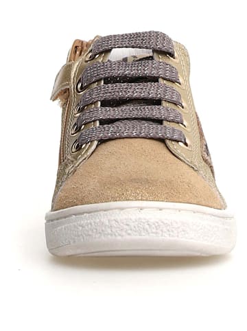 Naturino Skórzane sneakersy "Pinn" w kolorze złotym