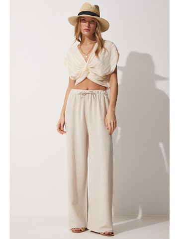 Happiness Istanbul Spodnie w kolorze beżowym