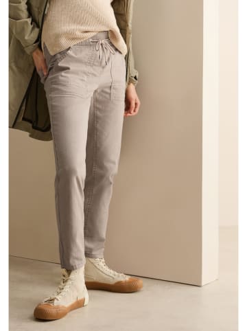 Cecil Spodnie dresowe w kolorze beżowym