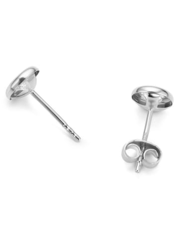 Revoni Witgouden oorstekers met diamanten