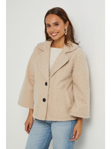 L'armoire de Suzette Kurtka przejściowa w kolorze beżowym