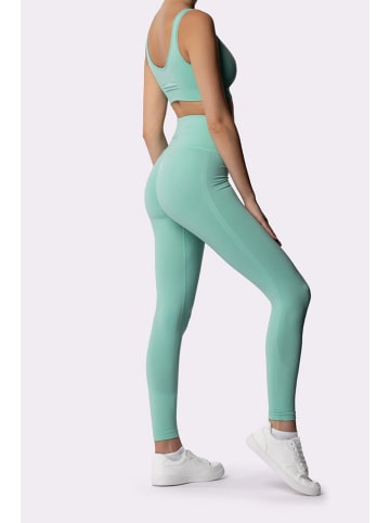 Spaio Legginsy sportowe "Adapt" w kolorze turkusowym