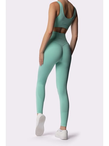 Spaio Legginsy sportowe "Adapt" w kolorze turkusowym