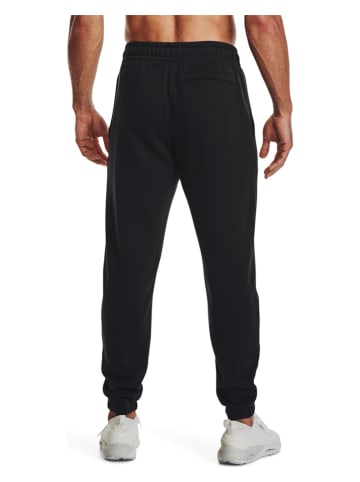 Under Armour Spodnie dresowe "Essential" w kolorze czarnym