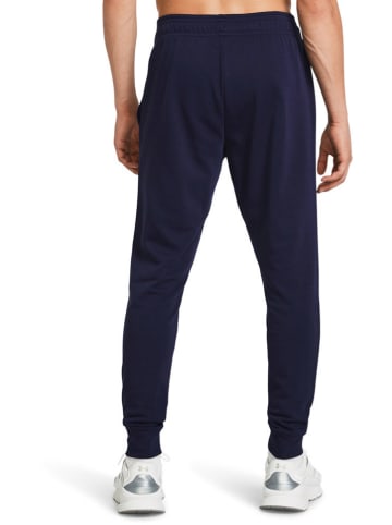 Under Armour Spodnie dresowe "Rival" w kolorze granatowym
