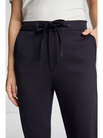 Rich & Royal Spodnie w kolorze granatowym