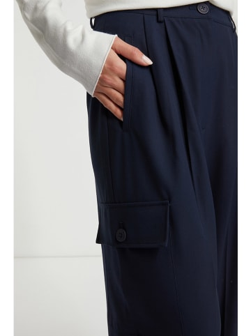 Rich & Royal Bojówki w kolorze granatowym