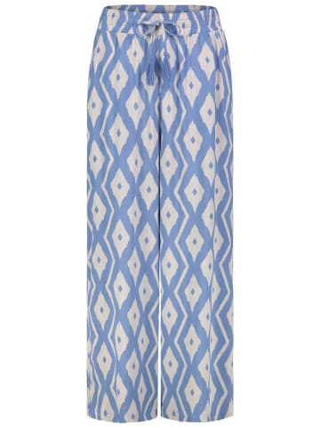 Sublevel Spodnie w kolorze błękitno-białym