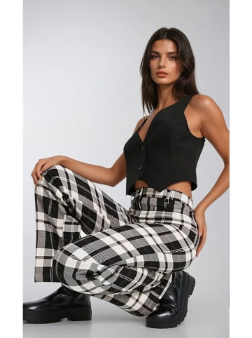 Monki Spodnie w kolorze czarno-białym