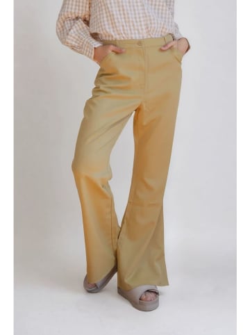 Monki Spodnie w kolorze żółtym