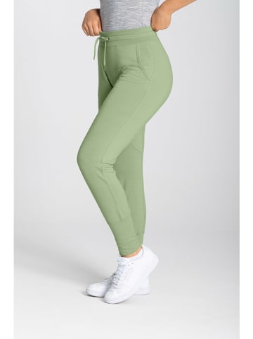 super.natural Spodnie dresowe "Essential" w kolorze jasnozielonym