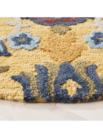 Safavieh Wełniany dywan "Blossom" w kolorze żółtym ze wzorem