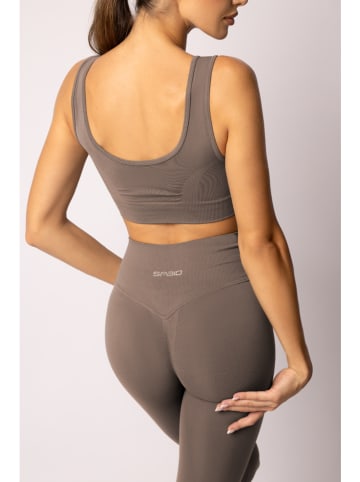 Spaio Legginsy sportowe "Flex 2.0" w kolorze beżowym