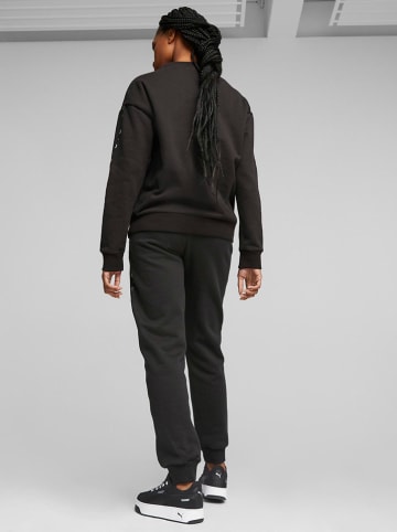 Puma Spodnie dresowe "ESS" w kolorze czarnym