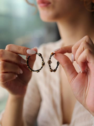 L'Atelier de Gaia Vergulde halfcreolen met edelstenen