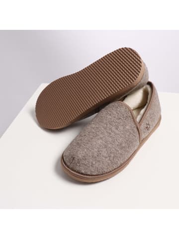 Kaiser Naturfellprodukte Kapcie wełniane w kolorze beżowym