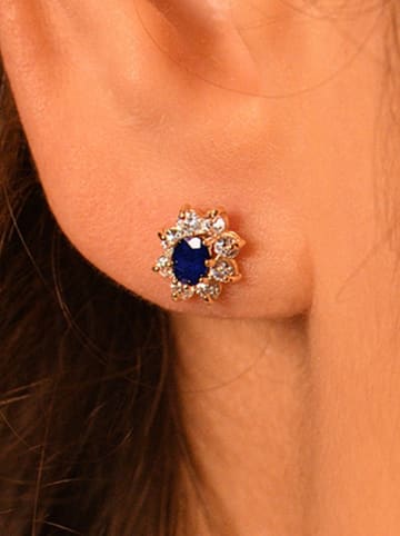 L instant d Or Gouden oorstekers "Margherite saffier" met edelstenen