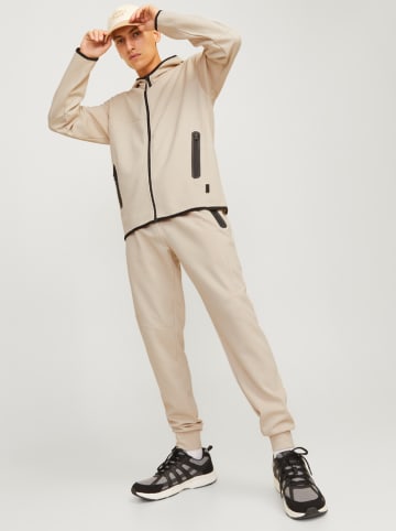 Jack & Jones Spodnie dresowe w kolorze kremowym