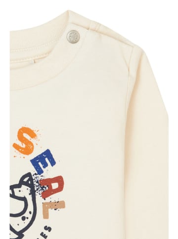 Noppies Koszulka "Grinestar" w kolorze kremowym