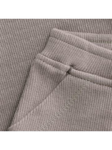 Noppies Spodnie dresowe "Tiverton" w kolorze beżowym