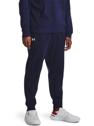 Under Armour Spodnie dresowe "Rival" w kolorze granatowym