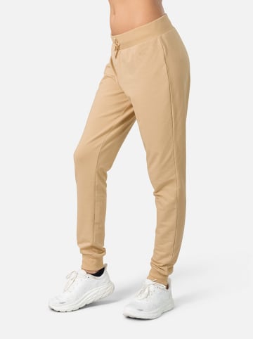 KARI TRAA Spodnie dresowe w kolorze beżowym