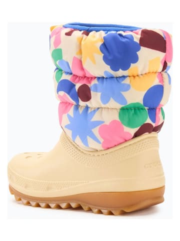 Crocs Kozaki zimowe "Classic NeoPuff" w kolorze beżowym ze wzorem